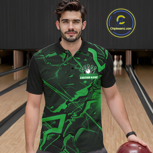 Male model wearing a bowling polo in a bowling lane featuring black and green cracked geometric artwork.