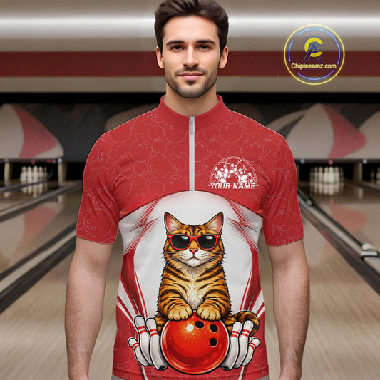 Male model at a bowling lane wearing a bowling quarter-zip shirt with a Bengal cat in sunglasses and bowling ball graphics.