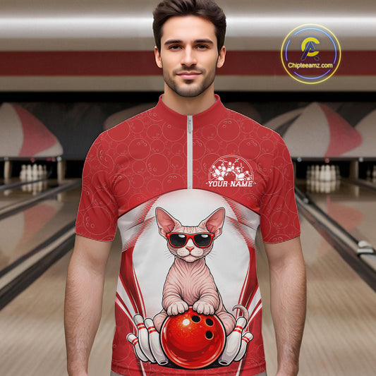 Male model at a bowling lane wearing a white and red quarter-zip bowling shirt with a sphynx cat in sunglasses resting against a bowling ball.