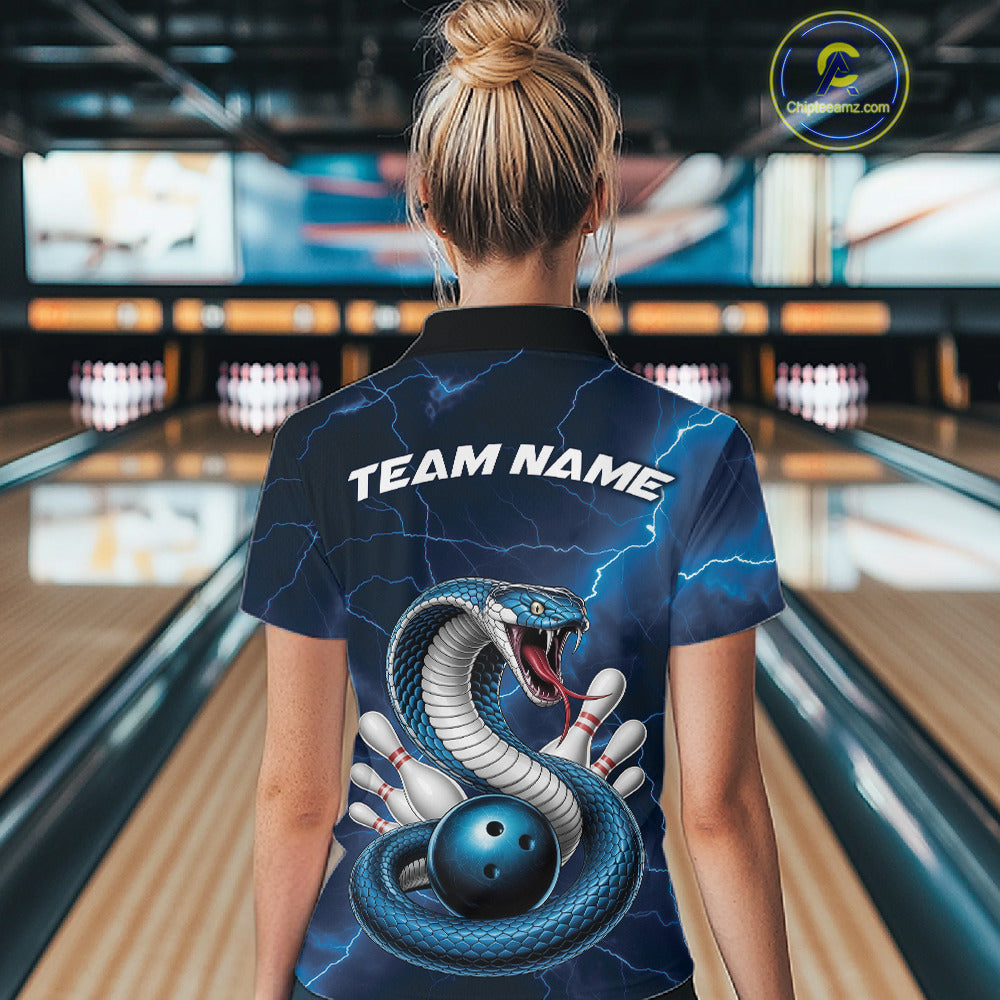 Back view of a womens bowling polo showcasing a blue cobra wrapped around a bowling ball with fantasy-inspired accents.