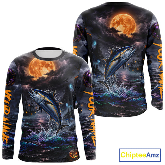 A long-sleeve crewneck shirt shown from both front and back, featuring a dramatic all-over Halloween-style print of a tuna fish jumping from dark ocean water under a large orange full moon, with orange text running down the sleeves and a ChipteeAmz logo in the bottom right corner.