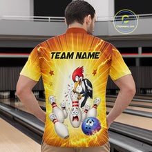 Load image into Gallery viewer, Man wearing a colorful bowling-themed shirt with cartoon characters in an indoor bowling alley.