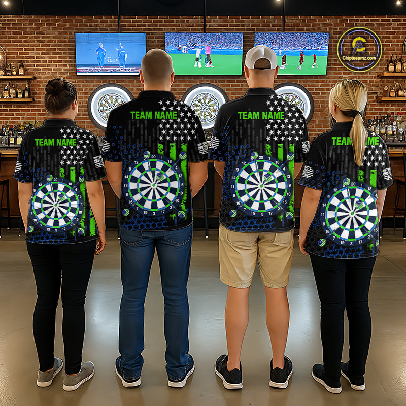 Back view of four people in a sports bar wearing matching custom darts team polo shirts with an green American flag design, a dartboard graphic, and 'TEAM NAME' text.