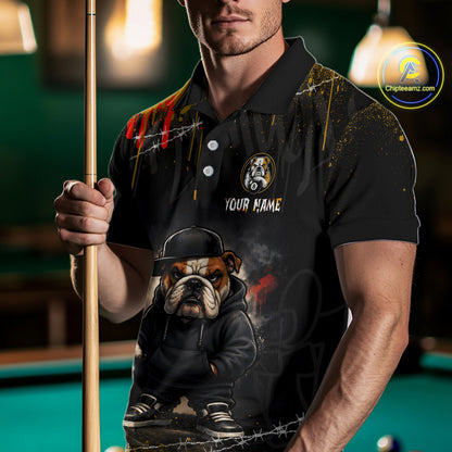A front view of a custom street style billiards polo shirt worn by a male model holding a pool cue. The shirt features a funny hip hop bulldog and an 8-ball on the front. A 'YOUR NAME' text placeholder. The background is a blurred billiards room with a green pool table.
