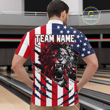 Load image into Gallery viewer, Man wearing a t-shirt with a lion graphic and 'TEAM NAME' text in an American flag pattern.