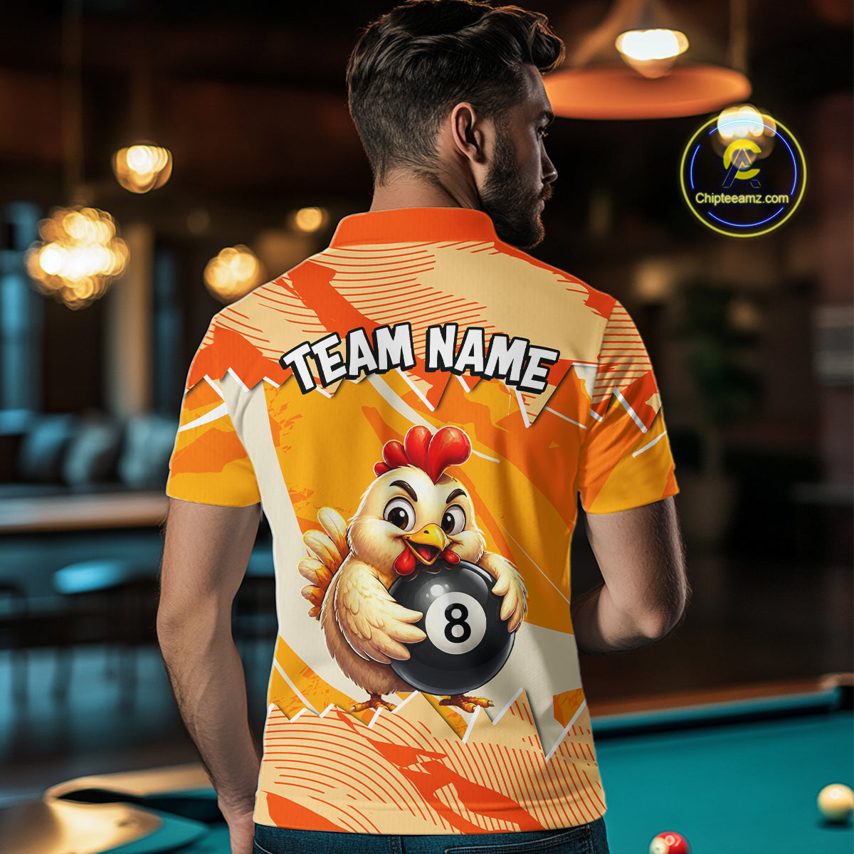 Person wearing a shirt with a chicken holding a pool ball design and 'Team Name' text.