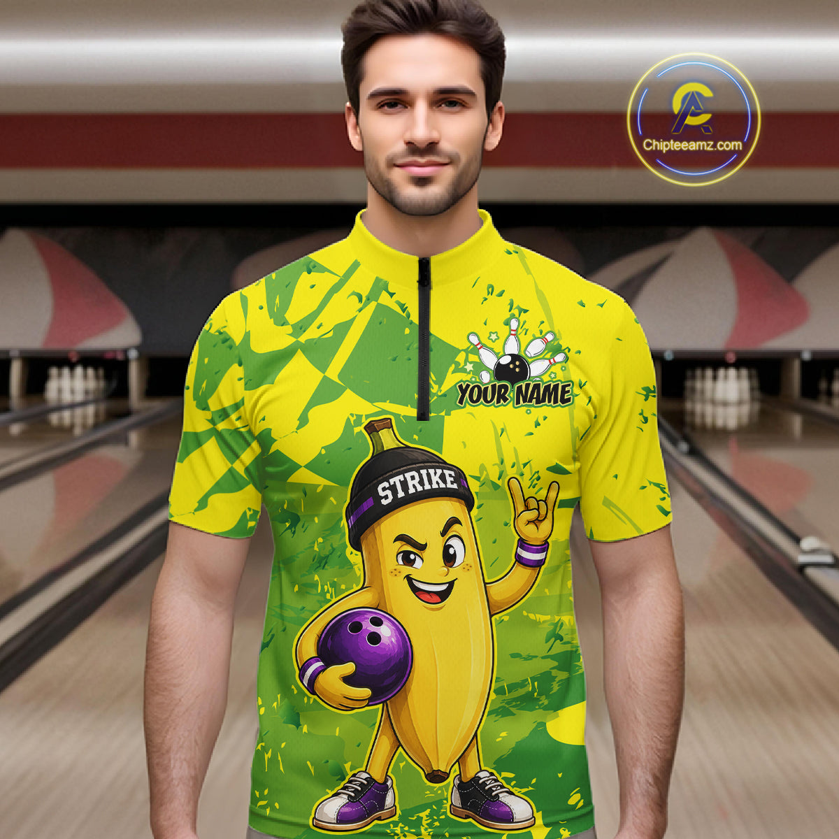 A man wearing custom yellow banana bowling quarter-zip shirt front view featuring a funny cartoon fruit and bowling ball, displaying Your Name, at the bowling alley