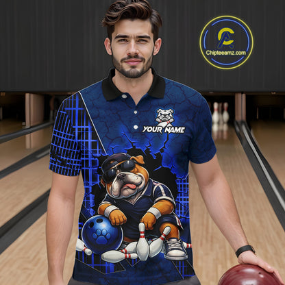 A man wearing a custom blue bowling-themed polo shirt with a bulldog graphic and 'YOUR NAME' text, standing in a bowling alley. 