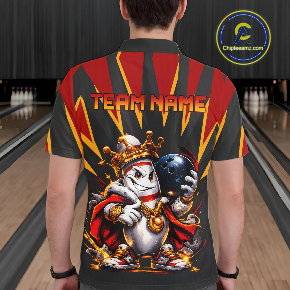 Person wearing a bowling-themed shirt with graphics and text in a bowling alley.