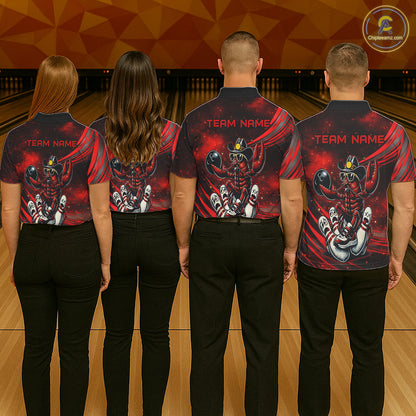 Four people wearing matching red and black shirts with a team logo on a bowling alley.