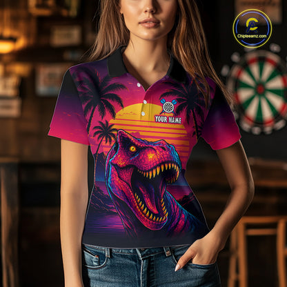 Women wearing darts polo shirt featuring a dinosaur holding a dartboard with sunset and palm tree artwork on a colorful background.