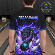 Load image into Gallery viewer, Person wearing a black shirt with a colorful design of a panther and bowling ball in a bowling alley.