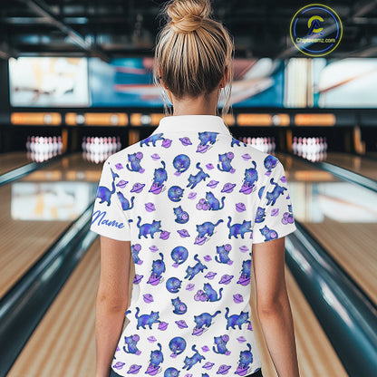 Women wearing a white shirt with cat pattern in a bowling alley.