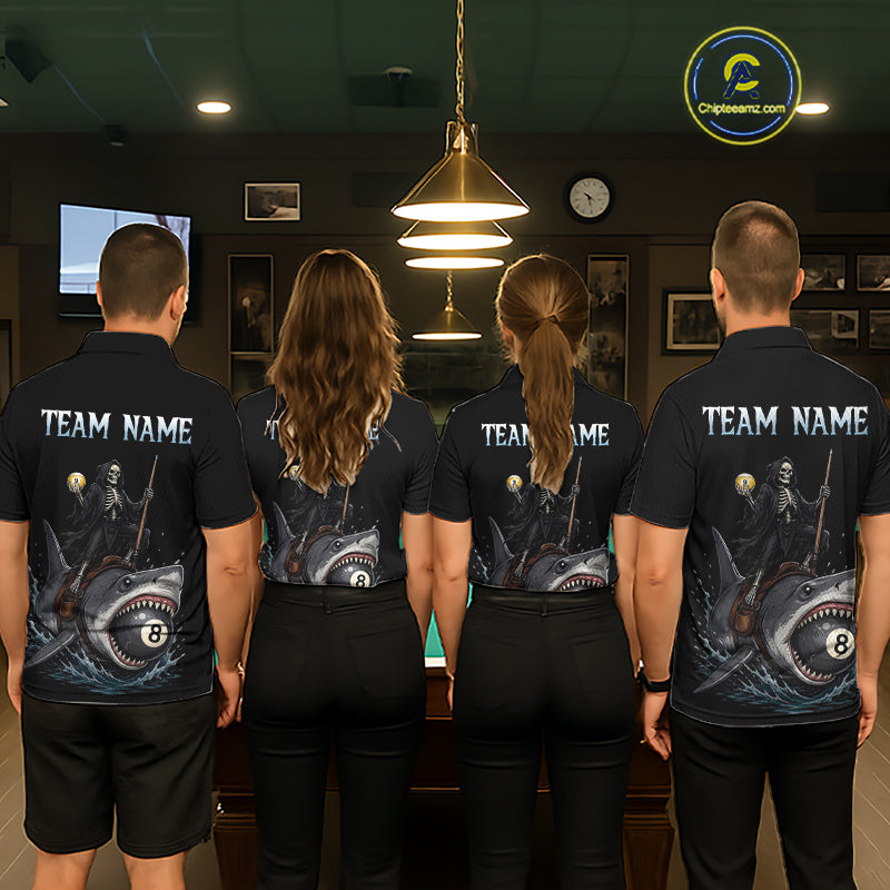 Four people wearing black shirts with a team name design, standing in a room with a pool table.