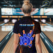 Load image into Gallery viewer, Woman wearing of a black bowling polo shirt with neon blue and orange cartoon bowling ball and pin graphics, plus custom team name text.