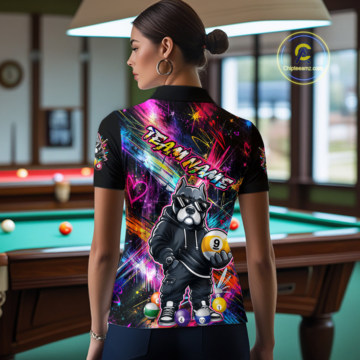 Women wearing personalized billiards polo shirt with a american bully dog holding a nine ball, integrated with colorful streaks and pool ball elements.