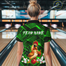 Load image into Gallery viewer, Woman wearing a green and black bowling polo shirt featuring a cool rooster mascot wearing sunglasses, a red bowling ball, bowling pins, and custom team name text.