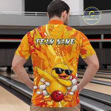 Load image into Gallery viewer, Person wearing a bright yellow bowling shirt with a duck design and 'Team Name' text, in a bowling alley.