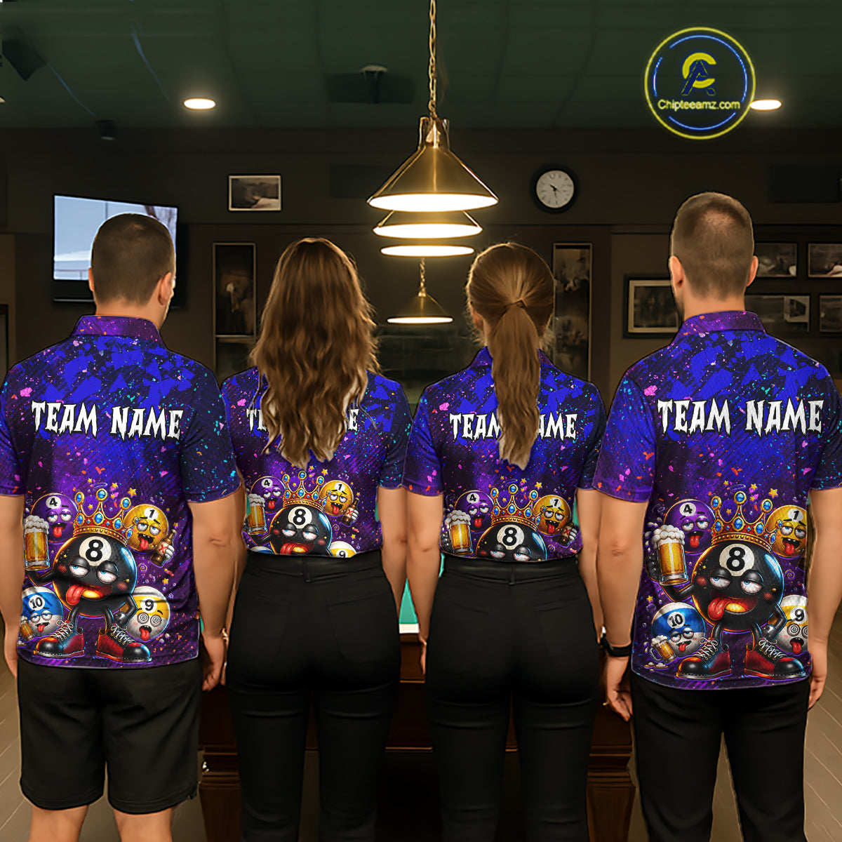 Four people standing with their backs to the camera in a dimly lit bar or lounge, wearing matching purple and blue graphic shirts with cartoon billiards characters and the text 'TEAM NAME' on the back.