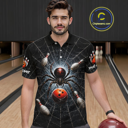 A man wearing a black short-sleeve polo shirt with a detailed bowling-themed spider graphic, standing in a bowling alley holding a bowling ball. The shirt features a large spider, bowling pins, and a red bowling ball on a web pattern.