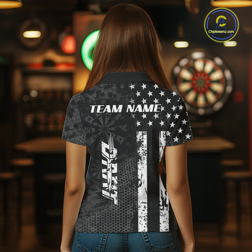 Women wearing darts polo shirt featuring dartboard patterns layered with american flag graphics and geometric details on a black background.