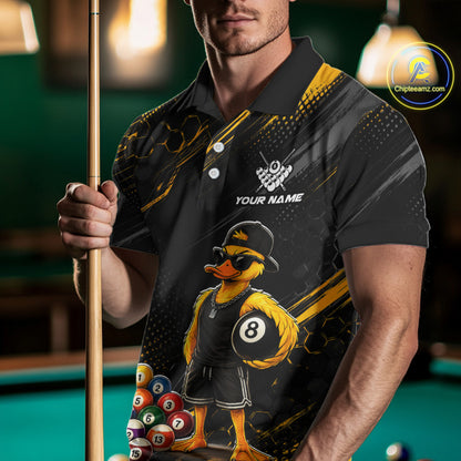 Men wearing billiards polo shirt featuring a duck holding an eight ball with colorful pool balls arranged on a black yellow background.