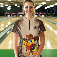 Load image into Gallery viewer, Person wearing a custom bowling shirt with a duck design in a bowling alley.