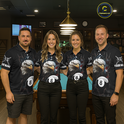 Four teammates in a billiards hall wearing matching black eagle-themed pool polos with cracked flag artwork, sleeve name text, and large 8-ball graphics.