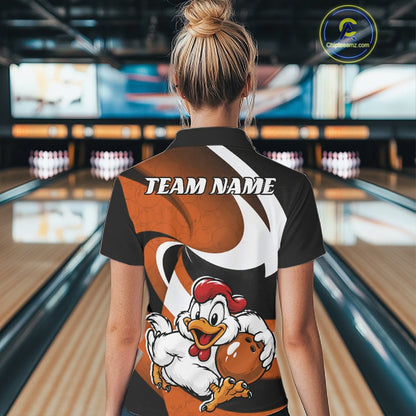 A woman viewed from behind wearing a custom bowling-themed polo shirt with a cartoon chicken graphic and 'TEAM NAME' text, set against a blurred bowling alley background.