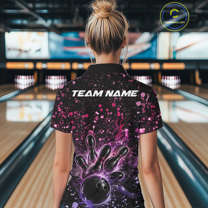 Back view of a female model in a black bowling polo shirt showcasing flaming bowling strike graphics and music-inspired accents.