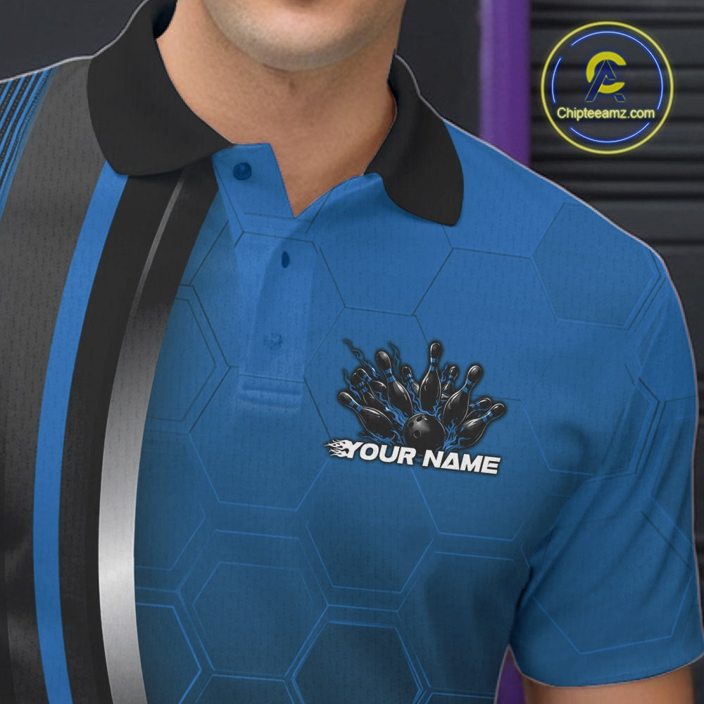 Close-up of the left chest area of a black and blue bowling polo shirt, featuring honeycomb design with a flaming bowling ball striking pins.