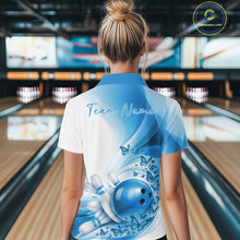 Load image into Gallery viewer, Back view of a female model wearing a white and blue bowling quarter zip with butterfly artwork and bowling graphics