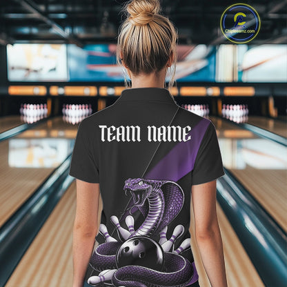 Back view of a black womens quarter-zip showcasing a purple cobra and bowling ball motif with scattered pins.