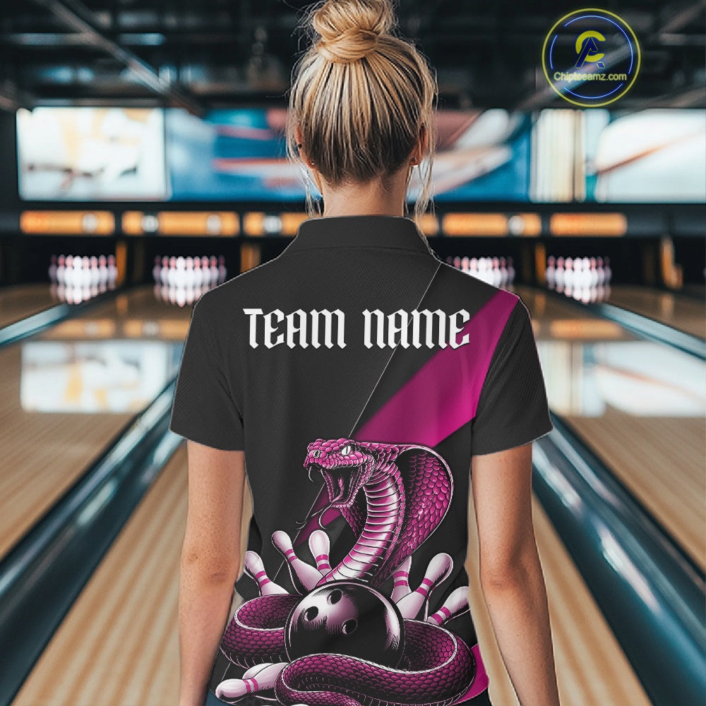 Back view of a black womens quarter-zip showcasing a pink cobra, bowling ball, and scattered pin graphics.