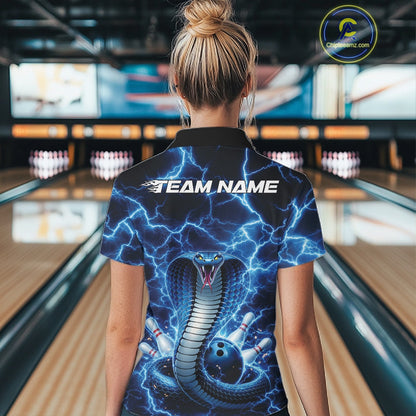 Back view of a womens bowling quarter-zip showcasing a blue cobra and bowling ball motif with lightning effects.