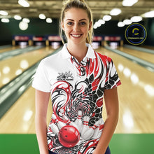 Load image into Gallery viewer, Female model at the bowling lane wearing a white bowling polo shirt with red and black tribal artwork and a bowling ball striking pins