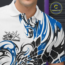 Load image into Gallery viewer, Close-up of the left chest on a white bowling polo shirt featuring blue and black tribal motifs, scale-inspired textures, and bowling-themed artwork