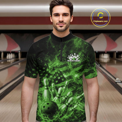Male model wearing a black and green bowling quarter-zip in a bowling lane with fiery bowling strike artwork and patriotic accents.