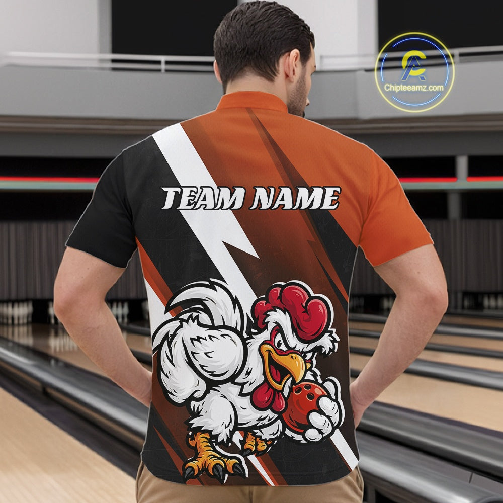 A man viewed from behind wearing a custom bowling shirt with a bold graphic design. The shirt features a black and orange color-blocked design with a white lightning bolt, the text 'TEAM NAME' across the upper back, and a large cartoon rooster holding a bowling ball on the lower back.
