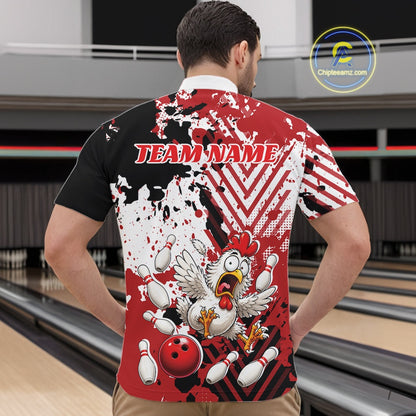 A man viewed from behind wearing a short-sleeve bowling jersey with a red, white, and black splatter design, a cartoon chicken breaking bowling pins, a red bowling ball, and the text 'TEAM NAME' across the upper back. Bowling lanes are visible in the background.