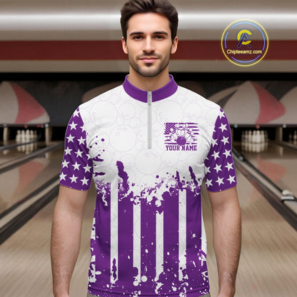 Male bowler posing on a lane wearing a personalized purple US flag performance bowling quarter-zip team shirt.