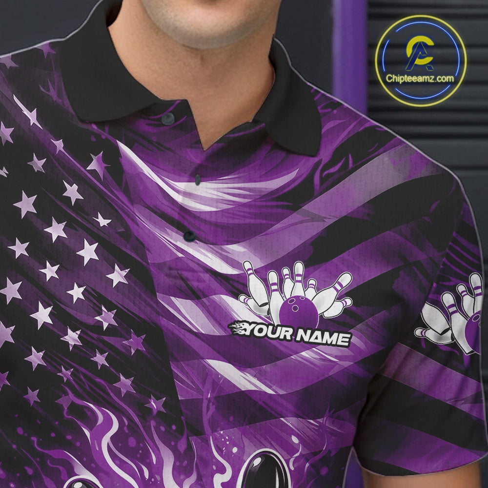 Close-up of the left chest on a black bowling polo shirt featuring purple flame bowling artwork and distressed flag details.