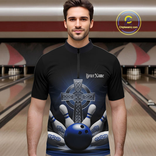 Male model front view in bowling lane wearing black quarter zip shirt featuring blue Celtic cross and dynamic bowling strike artwork