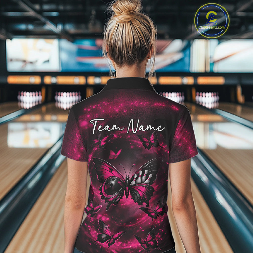 Back view of a female model in a bowling alley wearing a polo shirt showcasing a pink and black butterfly with a bowling ball body and smoky accents.
