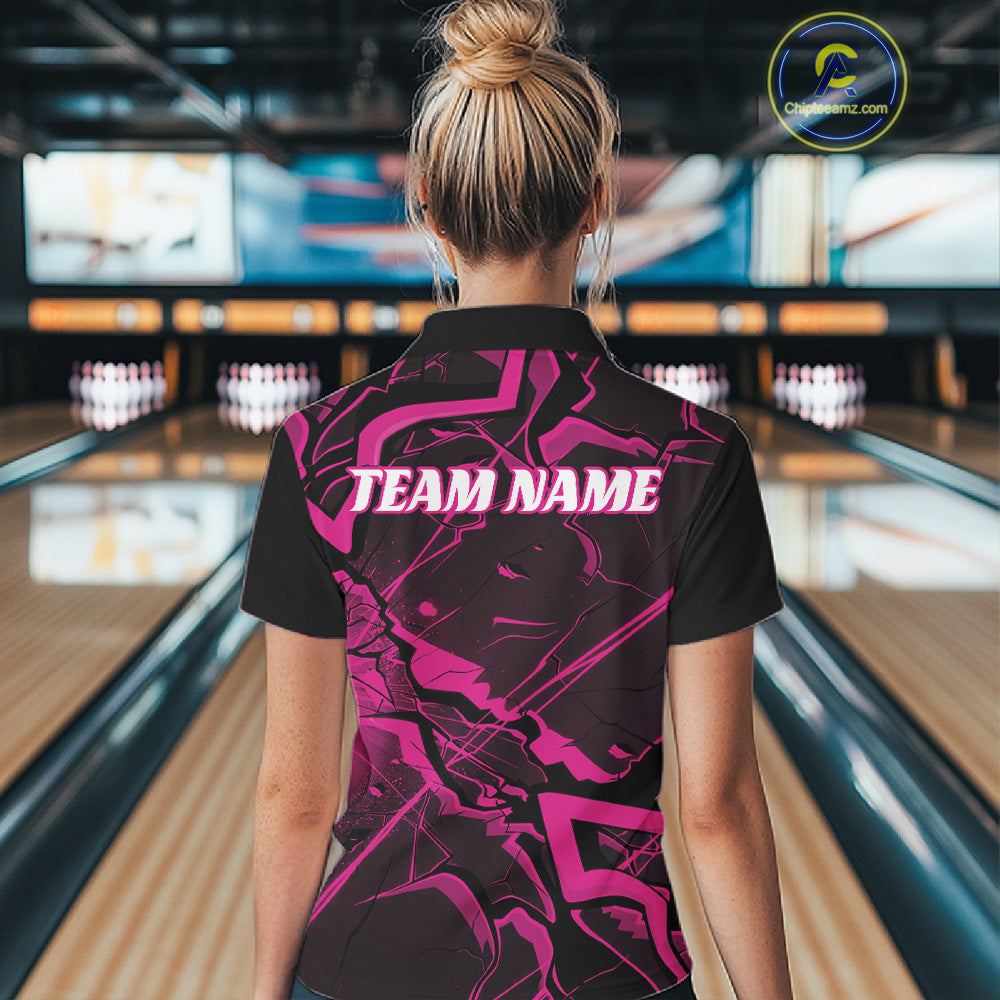 Back view of a black and pink bowling quarter-zip displaying a futuristic geometric pattern with sharp line details.