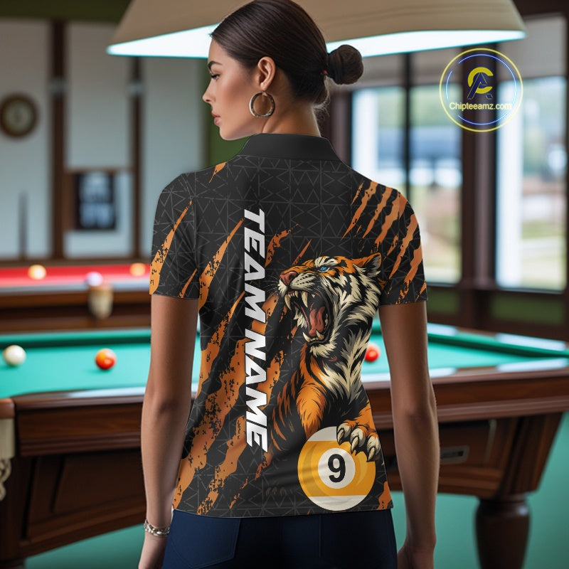 Female model back view wearing a polo shirt with roaring tiger graphics, billiard balls, and orange claw marks.