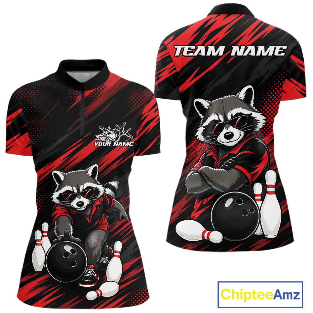 Front and back views of a women's short-sleeve bowling-themed quarter zip shirt. The shirt features a black base with bold red diagonal streaks and a large raccoon graphic wearing a red bowling shirt, holding a bowling ball with bowling pins around it.