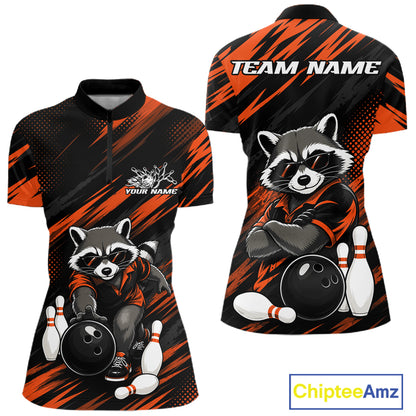 Front and back views of a women's short-sleeve bowling-themed quaeter zip shirt. The design features a raccoon wearing an orange and black bowling jersey, with bowling balls and pins, on a black background with orange diagonal streaks.