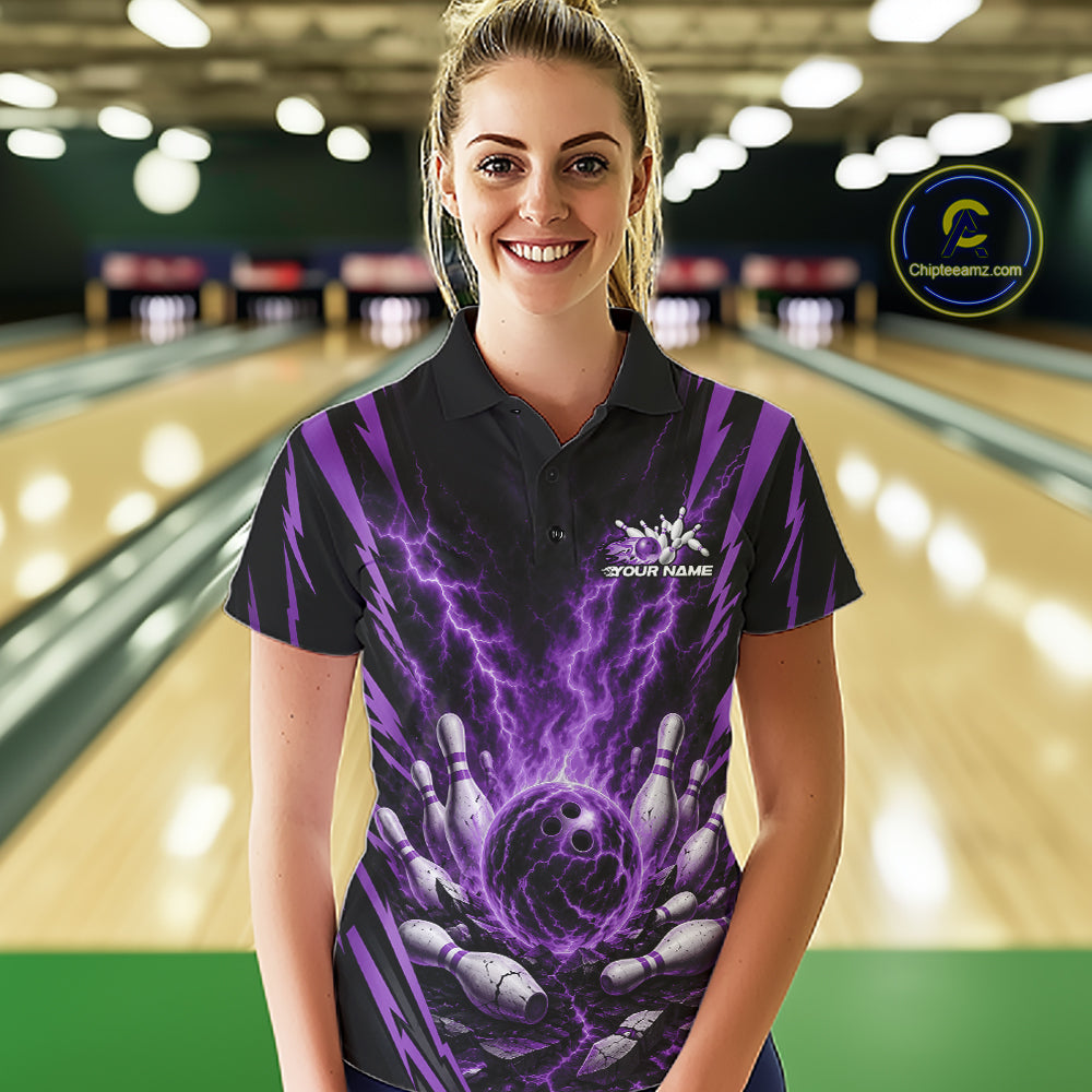 A woman wearing a black and purple bowling-themed short-sleeve polo shirt with a lightning design and a custom name printed on the chest, standing in front of a bowling alley background.