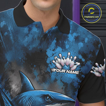 Blue and black polo shirt with shark design and 'Your Name' text, brand logo visible.